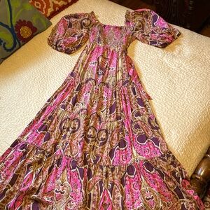 Burgundy printed shirred maxi dress; belted, puffed sleeves, lined, never worn